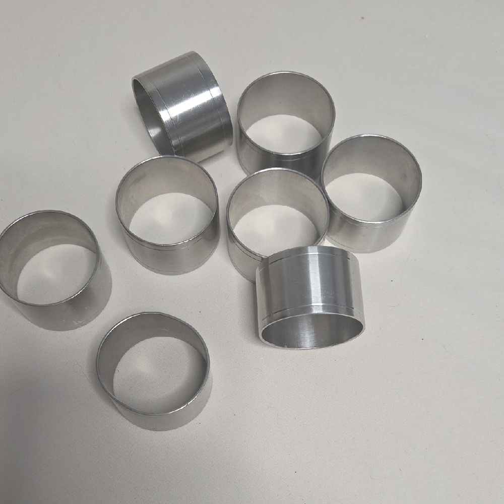 Set of Silvertone Napkin Rings (8)
